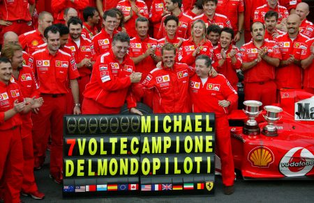 ===============================================  Michael Schumacher Scuderia Ferrari Malboro
celebrates year victory
Fosters Belgian Grand Prix 2004 SPA Francorchamps
date: 29.8. 
photo: Jiri Krenek=================================